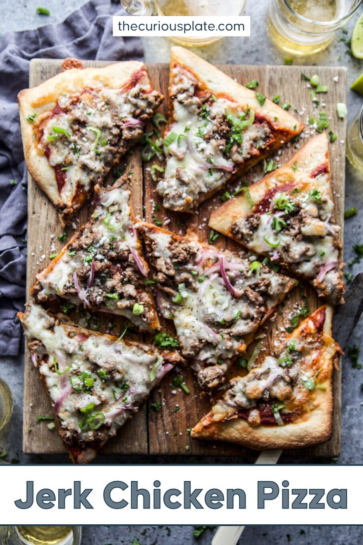 a sliced pizza on a cutting board with cheese and toppings