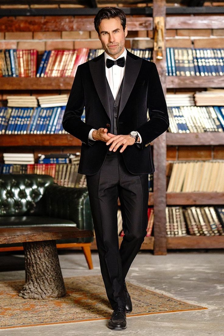 Unveil the epitome of refined elegance with our Black Velvet Slim-Fit Tuxedo 3-Piece ensemble. As you envelop yourself in the velvety embrace of this opulent attire, prepare to leave an indelible mark on the canvas of style and sophistication.  #suits #suit #slimfit #tuxedo #velvettuxedo #blacktuxedo #formallook #formalwear #mensstyle #menfashion Black Velvet Suit Mens, Black Velvet Blazer Men, Velvet Wedding Suit, Blazer Waistcoat, Double Breasted Tuxedo, Suit Stores, Velvet Wedding, Backyard Reception, Wedding Backyard