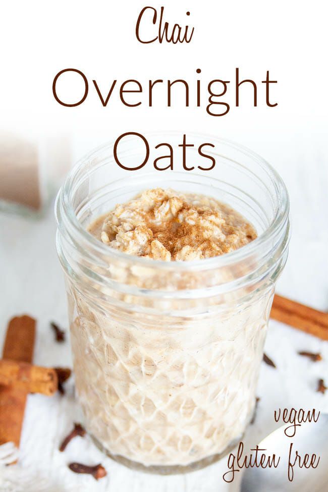 overnight oats in a glass jar with cinnamon sticks around it and the text overlay reads, chia overnight oats