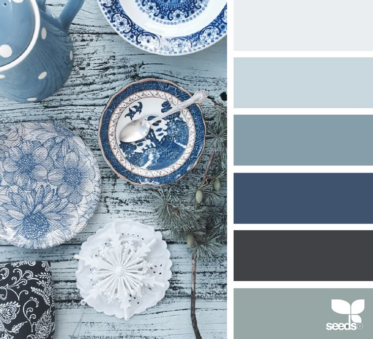 blue and gray color scheme with tea cups, plates and spoons