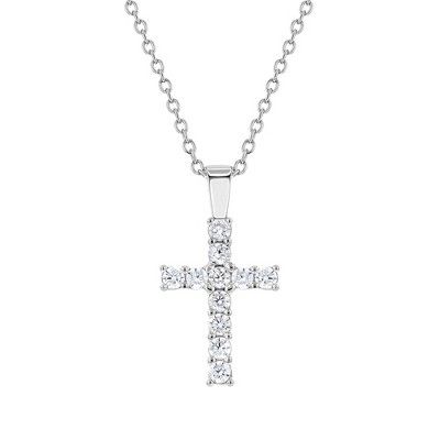 This dazzling cute sterling silver cross necklace for girls is made of 925 sterling silver and has multiple sparkling round cubic zirconias. Makes for an evocative gift on a loved ones special day whether it be their First Holy Baptism, Christening, First Holy Communion, First Reconciliation or Confirmation. A matching 16" chain is included. Packed carefully in a beautiful gift box. White Gold Cross Necklace With Brilliant Cut Cubic Zirconia, Cubic Zirconia Cross Necklace For Gift, Gift Vvs Clarity Sterling Silver Cross Necklace, Sterling Silver Cross Necklace With Brilliant Cut, Brilliant Cut Cubic Zirconia Cross Pendant Necklaces, Sterling Silver Brilliant Cut Cross Pendant Necklace, Brilliant Cut Cubic Zirconia Cross Necklace As Gift, Cubic Zirconia Brilliant Cut Cross Pendant Necklace, Brilliant Cut Cubic Zirconia Cross Pendant Necklace