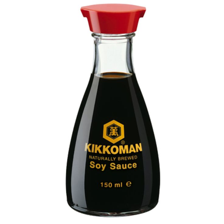 kikoman soy sauce in a glass bottle with red cap on the top and bottom