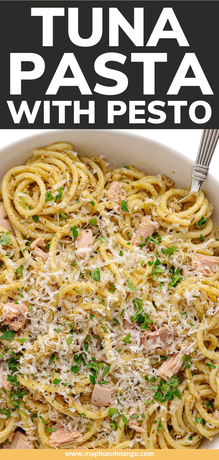 tuna pasta with pesto and parmesan cheese in a white casserole dish