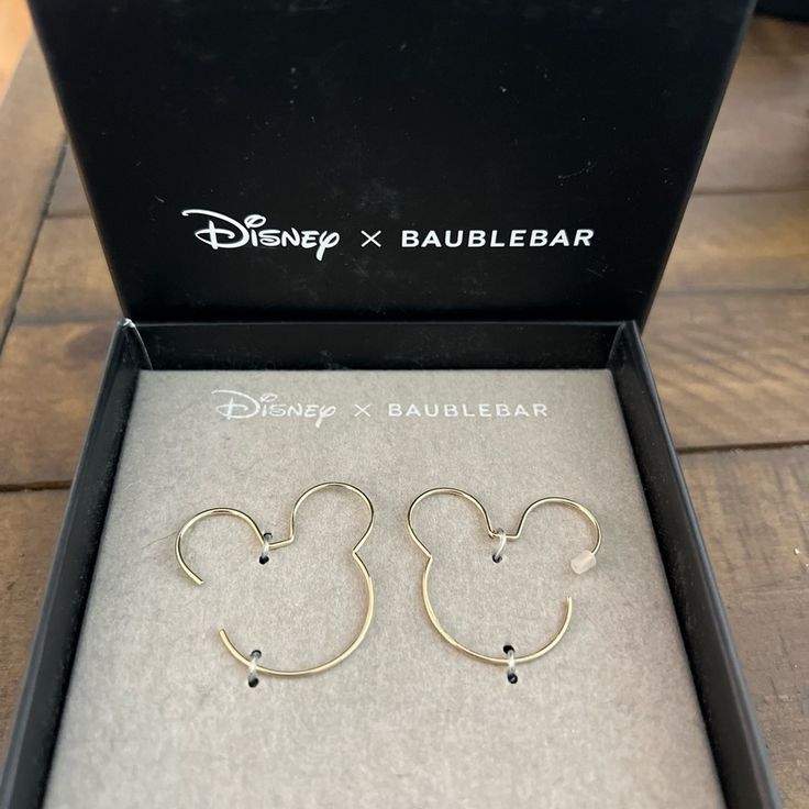 Here Is A Pair Of Disney X Baublebar Mickey Mouse Silhouette Head Earrings Wire Hoop Outline Gold New I Have A Lot Of Disney Earrings For Sale So Bundle And Save On Shipping Silhouette Head, Mickey Mouse Silhouette, Mouse Earrings, Mouse Silhouette, Pearl Statement Earrings, Disney Earrings, Minnie Mouse Earrings, Cubic Zirconia Hoop Earrings, Peach Earrings