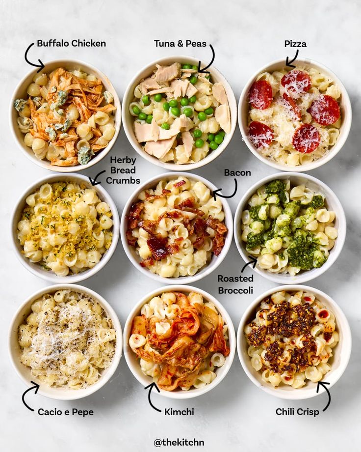 six bowls with different types of pasta in them on a white table top next to each other