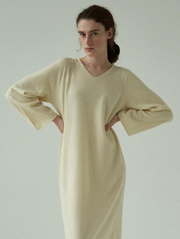 Composition : 10 cashmere, 65 wool, 25 nylonCountry of Origin : Republic of Korea Cozy Cream Sweater Dress For Spring, Cream Long Sleeve Sweater Dress For Work, Cream V-neck Sweater Dress For Fall, Fall Cream V-neck Sweater Dress, Cozy Cream Long Sleeve Dress, Cozy Long Sleeve Cream Dress, Cozy Beige Sweater Dress For Spring, Chic Cream Dress For Loungewear, Oversized Beige Sweater Dress For Spring