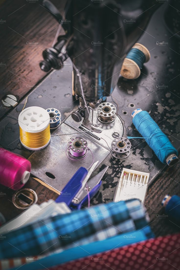 sewing supplies and thread on a table