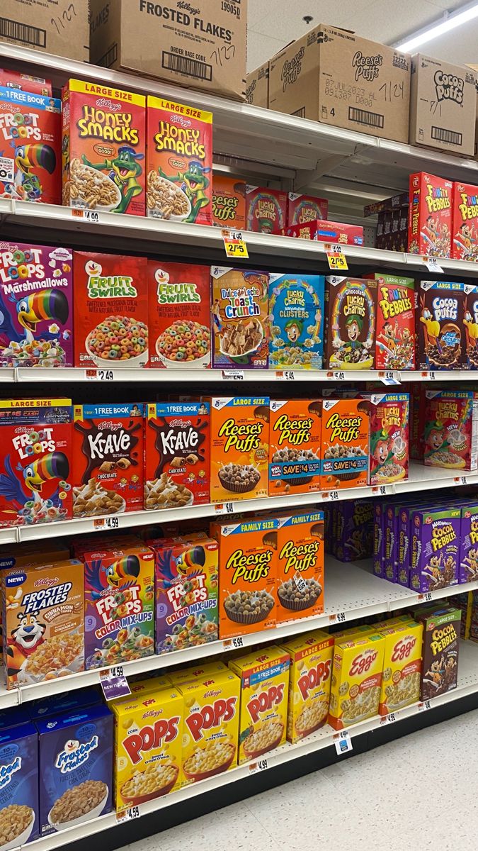 shelves in a grocery store filled with cereal