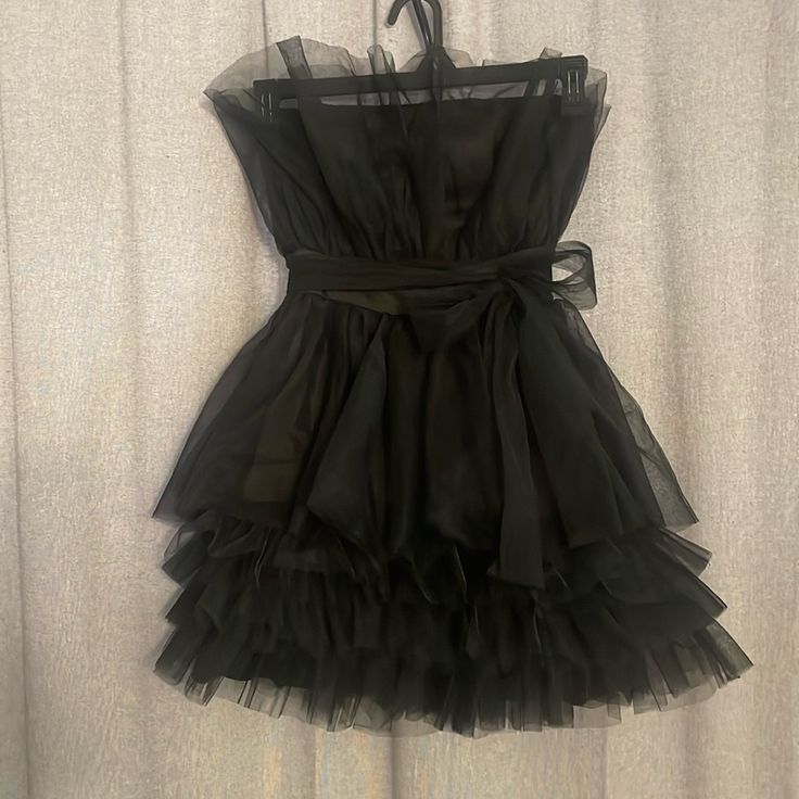 This Really Cute Strapless Party Dress Features Layers Of Tulle Ruffles Black Size S New With Tag ($49.99) Elastic To Hold Up Top Sash At Waist Clean Smoke Free Home Thanks For Looking. Black Strapless Summer Cocktail Dress, Black Strapless Cocktail Dress For Summer, Black Strapless Dress For Date Night Prom, Chic Black Strapless Dress For Prom, Black Flirty Strapless Dress For Prom, Black Flirty Strapless Prom Dress, Flirty Black Strapless Dress For Prom, Flirty Black Strapless Prom Dress, Flirty Black Mini Dress For Prom