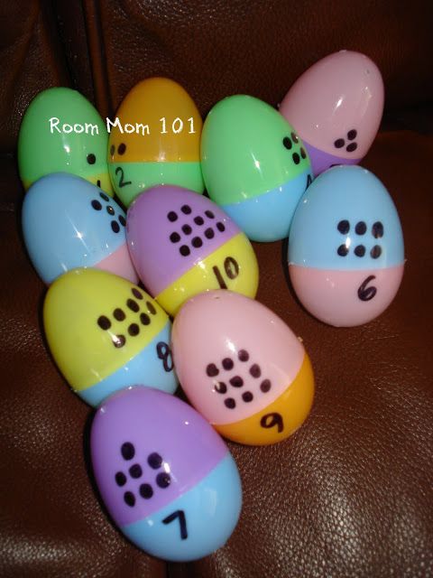 a group of colorful dices sitting on top of a brown leather couch next to each other