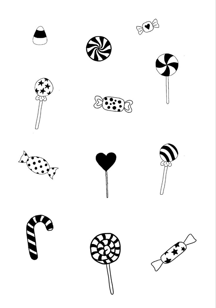 some candy canes and lollipops are drawn in black on white paper