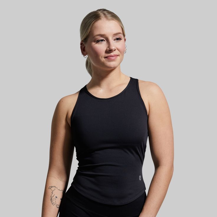 Just like workouts, not all tanks are built the same. When the burn starts setting in, you need workout apparel that’s built to keep you pushing ‘til the end. Made from a stretchy, moisture-wicking fabric with a flattering fit for athletic builds, the Pina is the kind of tank you can rely on to get you through the toughest days at the gym. Versatile Compressive Tank Top For Sports, Stretch Racerback Activewear For Workout, Athleisure Tops With Built-in Bra For Training, High Stretch Training Tank Top With Light Support, Versatile Stretch Tank Top For Training, Athleisure High Stretch Tank Top For Sports, Athleisure Sports Tank Top, High Stretch Athleisure Tank Top For Sports, Sporty High Stretch Tank Top For Training