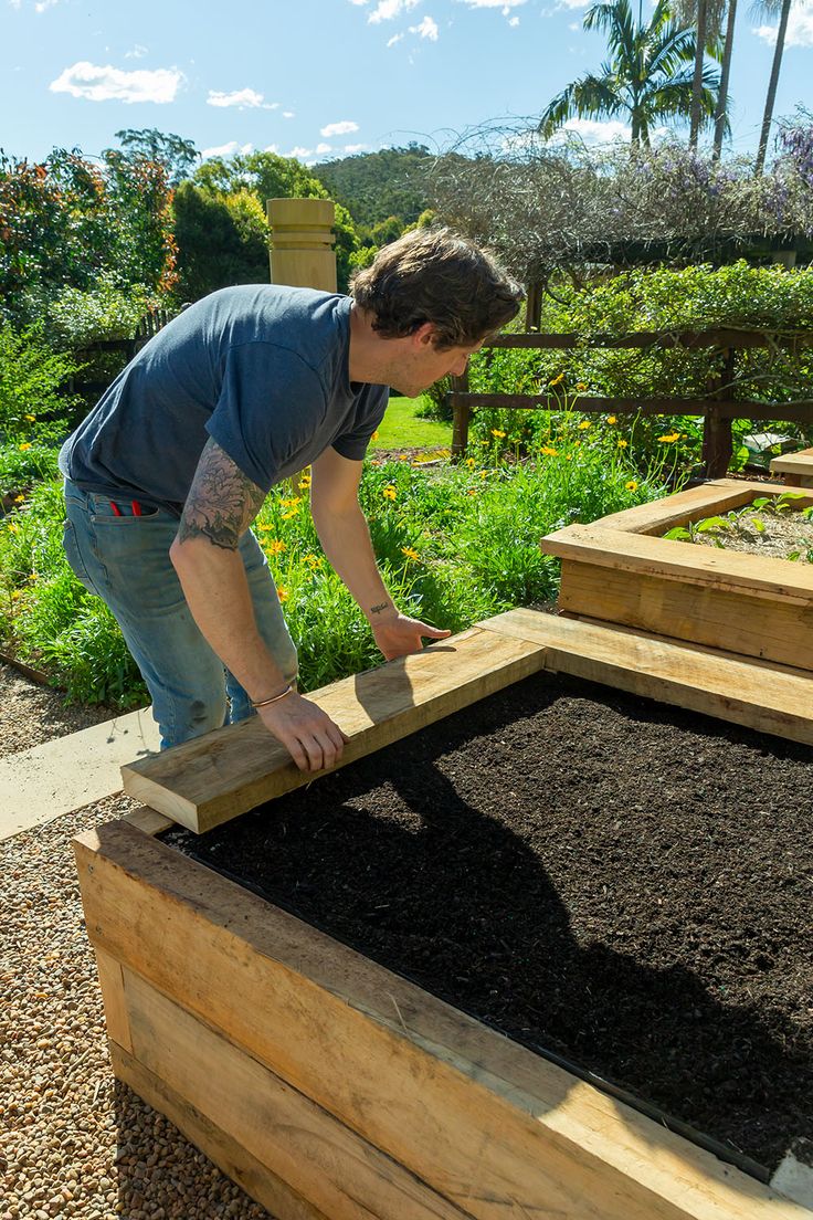 Creating Raised Garden Beds, Stylish Raised Garden Beds, Garden Design With Raised Beds, Raised Garden Beds Beginner, Raised Garden Beds Small Yard, Raised Bed Planting Ideas, Raised Garden Beds Along Fence, Garden Beds Along Fence, Stone Garden Beds