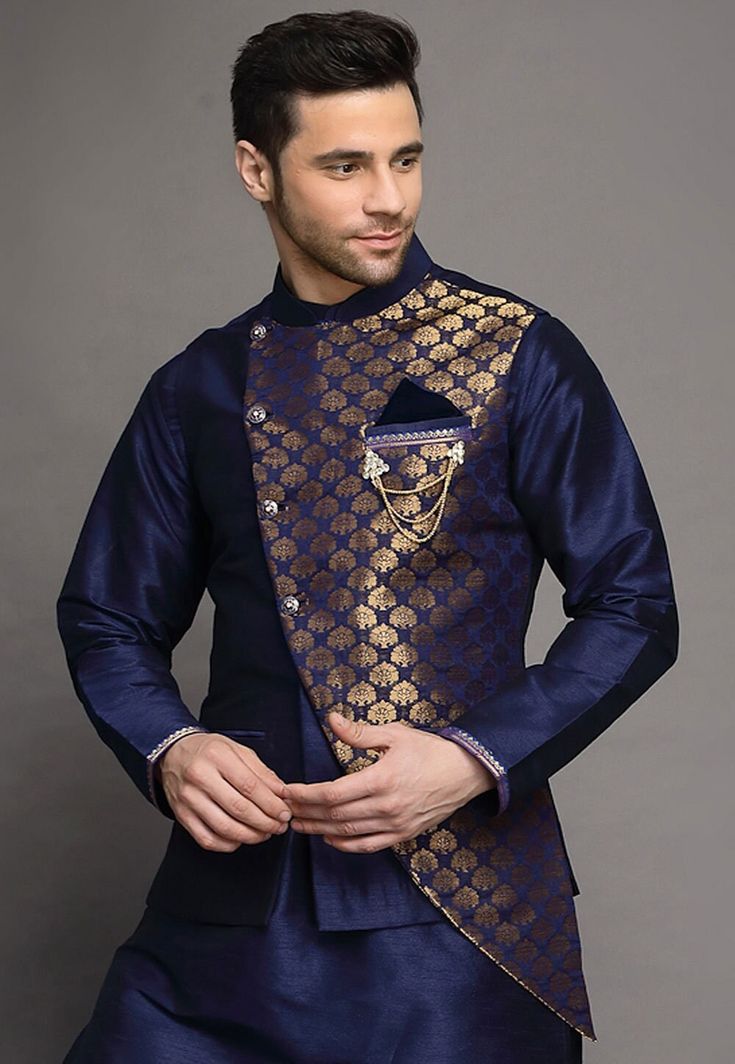 Art Brocade Silk Nehru Jacket in Navy BlueThis Readymade Sleeveless attire is Enhanced with Buttons. Crafted in Chinese Collar NeckDo note: Brooch and Kurta shown in the image is for presentation purposes only. Half to one inch may vary in measurement. (Slight variation in actual color vs. image is possible) We sell all kinds of menswear. Mens Kurta | Mens Kurta Pajama | Mens Sherwani | Mens Sherwani Sets | Traditional Menswear | Partywear Menswear | Indian Mens Dresses | Diwali Kurta | Kurta Pa Festive Blue Nehru Jacket With Traditional Drape, Royal Blue Bandhgala For Festive Occasions, Royal Blue Nehru Jacket For Formal Occasions, Formal Blue Nehru Jacket With Stand Collar, Blue Formal Nehru Jacket With Stand Collar, Blue Nehru Jacket With Stand Collar For Winter, Blue Winter Nehru Jacket With Stand Collar, Blue Nehru Jacket With Traditional Drape For Formal Occasions, Elegant Blue Outerwear With Zari Work