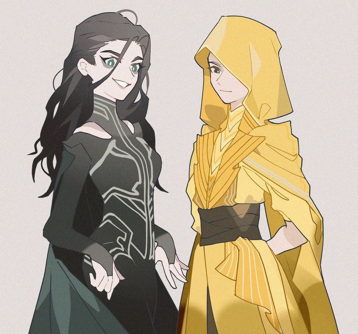 two women dressed in yellow and black standing next to each other, one wearing a veil