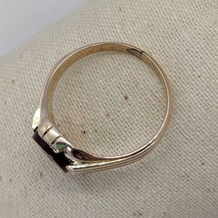 Victorian-era gold jewelry was often made in yellow gold with a soft rose gold hue. This handsome 1800s ring is crafted in 14k rosy gold that has a warm, rich appearance. The focal point is a hard-stone intaglio of a Roman soldier carved from carnelian. This ring is a generous size 12 and would make a unique wedding ring or right-hand statement ring. Please note that this ring is a true antique with over a 100-year history. You will notice in the photos there is white metal on the bottom of the Classic 14k Rose Gold Ruby Ring For Anniversary, Formal 14k Rose Gold Signet Ring, Classic Gold Ruby Ring Collectible, Vintage 14k Rose Gold Rings In Gold Color, Vintage 14k Gold Ruby Ring For Formal Occasions, Vintage 14k Rose Gold Jewelry For Formal Occasions, Classic Ruby Ring In 14k Rose Gold, Antique Rose Gold Ruby Ring For Formal Occasions, Victorian Rose Gold Ruby Ring For Formal Occasions