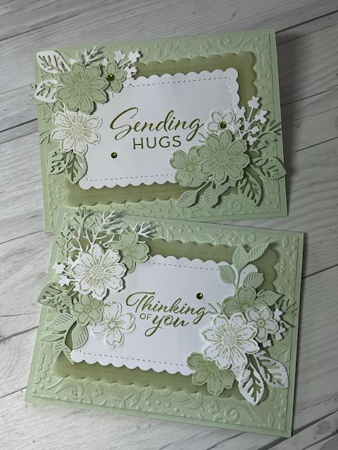 two cards with flowers on them and the words sending hugs written in cursive writing