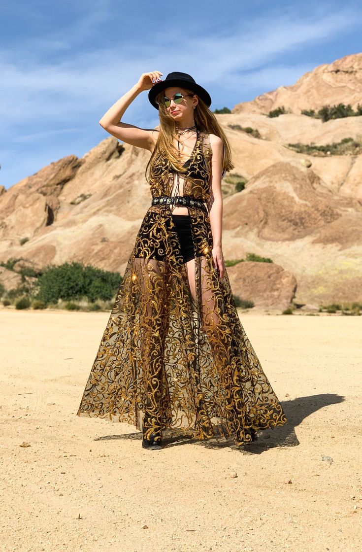 Sparkling black and gold cape dress. This cape dress completes any looks and outfits for festivals and parties🔥✨ All sizes are available. belt is not included Burning Man Fashion Woman, Ultra Music Festival Outfits, Festival Cape, Cochella Outfits, Cape Fashion, Burning Man Fashion, Hand Painted Denim Jacket, Painted Denim Jacket, Burning Man Outfits