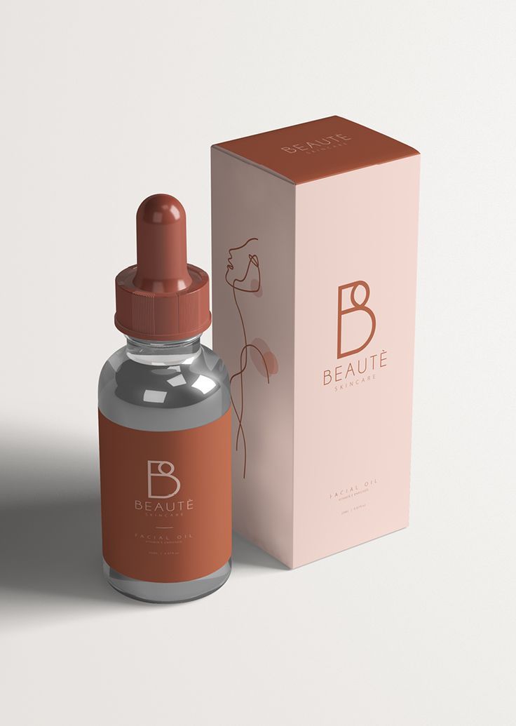 a bottle of brown liquid next to a pink box on a white background with the word b beaute in it