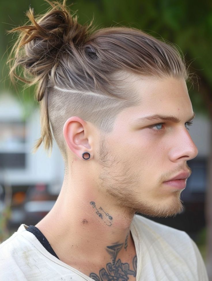 Man Bun Fade Undercut Hairstyles, Long Hair With Faded Sides Men, Hairstyles For Undercut Long Hair, Long Hair Faded Sides Men, Man Bun Hairstyles Undercut, Undercut Designs Men, Boys Man Bun Haircut, Long Undercut Men, Men Undercut Hairstyle