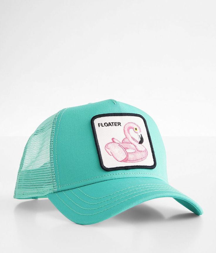 a turquoise hat with a pink flamingo patch on it