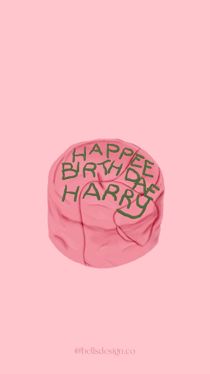 a pink birthday hat with the words happy birthday harry written in green on it's side