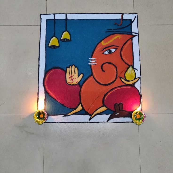 a painting on the ground with lights around it