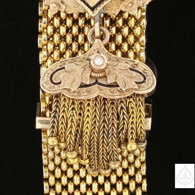 Description: Add a touch of vintage charm to your jewelry collection with our Antique Victorian Slide Bracelet. This one-of-a-kind piece features a unique and elegant design that is sure to turn heads. With its intricate details and timeless style, this bracelet is the perfect accessory for any occasion. Specifications: Material: Gold Design: Victorian Slide Item Code: 889971 Elegant Vintage Charm Jewelry, Antique Cuff Bracelet With Intricate Design For Formal Occasions, Formal Cuff Bracelet With Intricate Design, Heirloom Cuff Bracelet With Intricate Design For Formal Occasions, Luxury Vintage Charm Jewelry For Wedding, Elegant Wedding Bracelets With Vintage Charm, Luxury Vintage Charm Wedding Jewelry, Victorian Cuff Bracelet With Intricate Design For Formal Events, Luxury Yellow Gold Jewelry With Vintage Charm