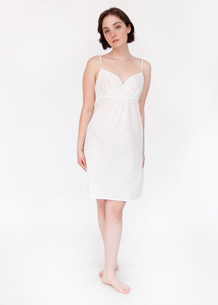 Under a dress or just by itself this light weight 100% cotton slip dress is a Matta essential. Summer V-neck Chemise With Built-in Bra, Classic V-neck Mini Dress For Daywear, Spring Cotton Sundress For Daywear, Cotton Smocked Sundress For Daywear, Cotton Sleeveless Sundress For Daywear, Fitted Slip Dress With Straight Neckline For Daywear, Cotton Sundress With Straight Neckline, Feminine V-neck Chemise For Daywear, Cotton Sundress For Daywear