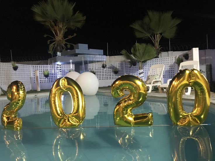 the numbers are in gold foil on the pool