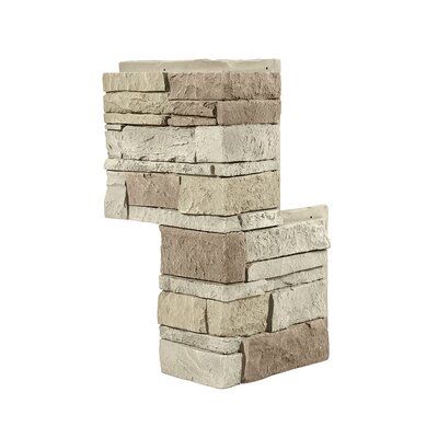 a stack of stone blocks sitting on top of each other in front of a white background