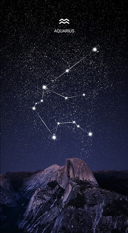 the zodiac sign aquarius on a night sky with mountains and stars in the background