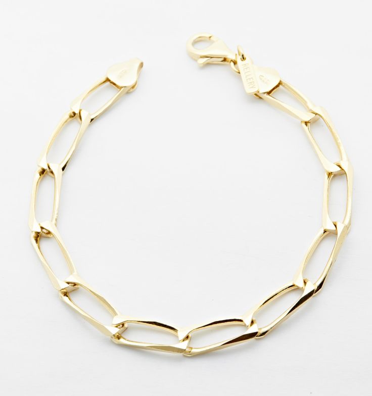 The artful chain bracelet can be worn alone or stacked with other bracelets for a playful look. Made out of sterling silver and gold vermeil, this piece is sure to become your go-to everyday jewelry that makes a statement while still being understated enough to wear every day. Gold Sterling Silver Box Chain Bracelet, Gold Sterling Silver Charm Bracelet, Everyday Sterling Silver Bracelet With Oval Link Box Chain, Everyday Gold Link Jubilee Bracelet, Everyday Gold Link Bracelet With Jubilee Style, Everyday Yellow Gold Chain Bracelet, Everyday Box Chain Bracelet With Oval Links, Everyday Oval Link Box Chain Bracelet, Yellow Gold Oval Link Chain Bracelet For Everyday