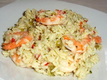 rice with shrimp and vegetables on a white plate