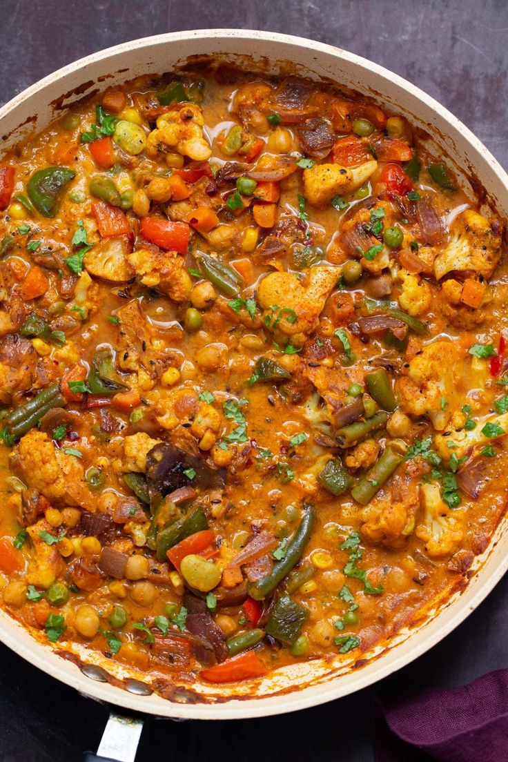 a large pot filled with food on top of a table