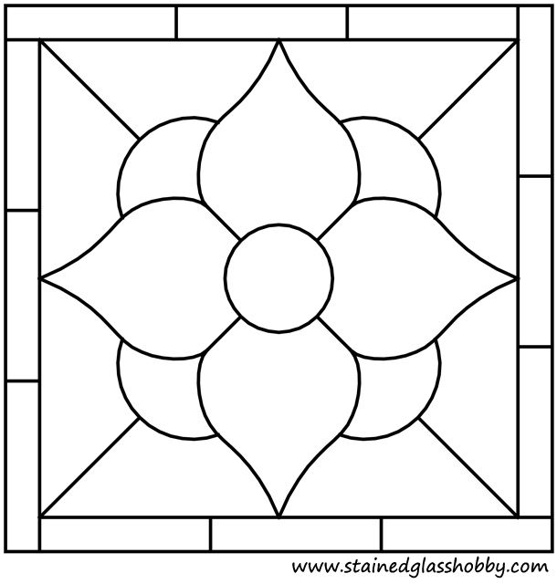 an image of a stained glass window with the shape of a flower in black and white