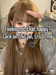 a girl with long brown hair holding her hand up to her head and the caption saying feeling not that happy? click on this pin, trust me