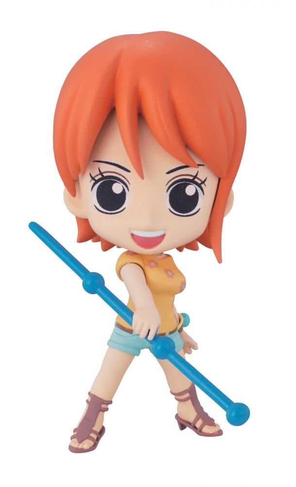 an action figure with red hair and big eyes holding a blue object in her hand