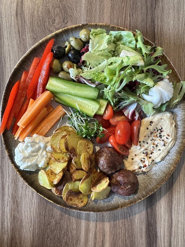 a plate full of different types of vegetables