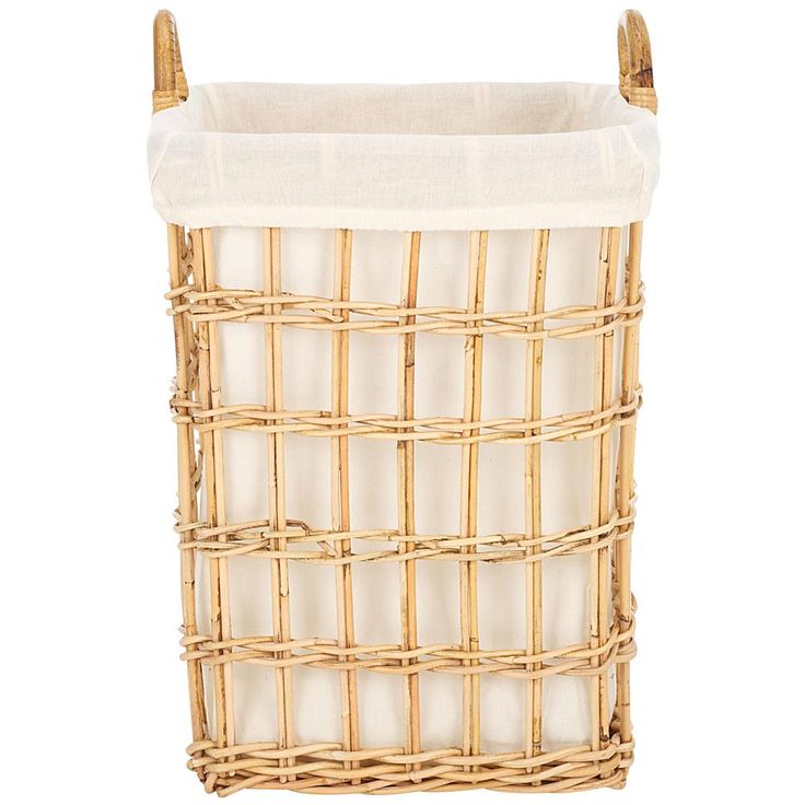 a basket that is made out of bamboo and has a white lining on the bottom