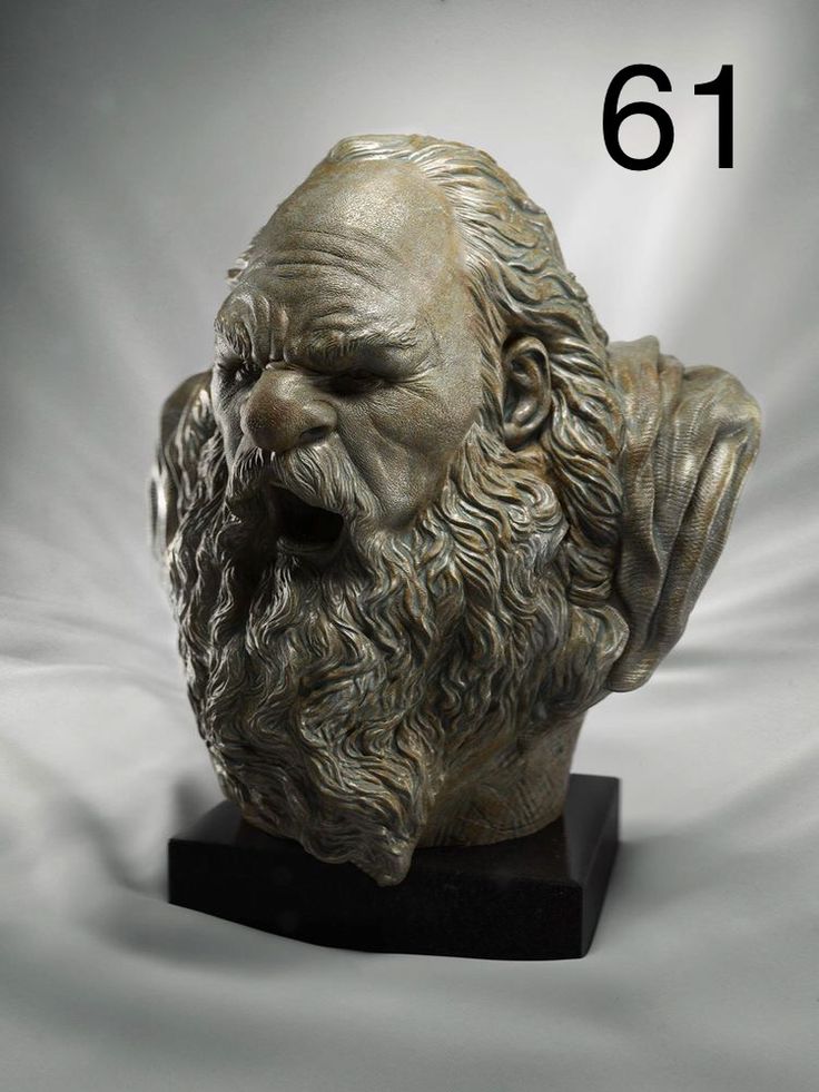 a statue of an old man with a beard