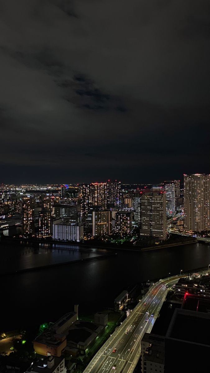 an aerial view of a city at night