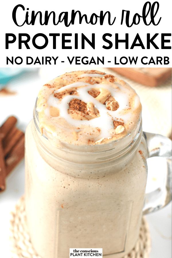 cinnamon roll protein shake in a mason jar with text overlay that reads, cinnamon roll protein shake no dairy vegan low carb