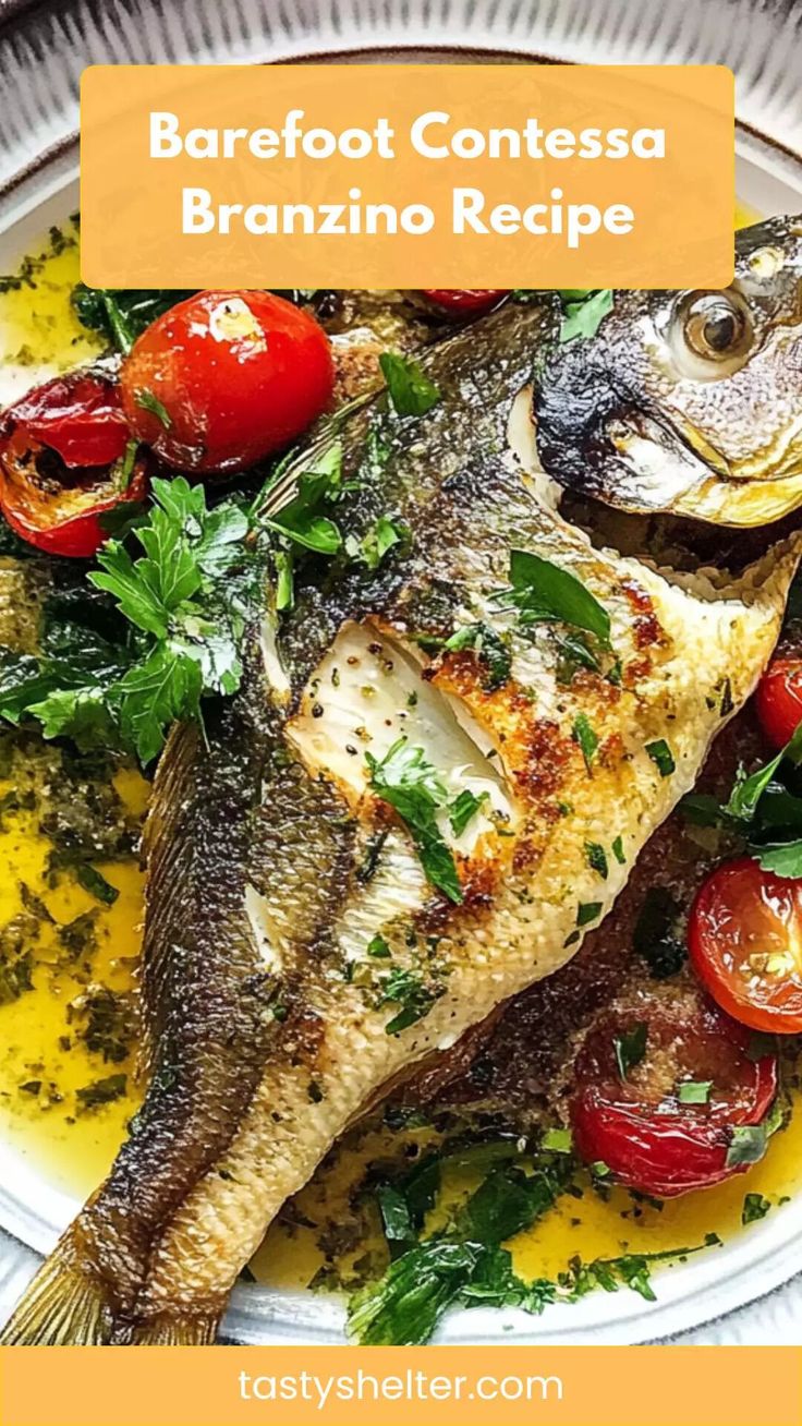 a white plate topped with fish, tomatoes and parsley on top of yellow sauce