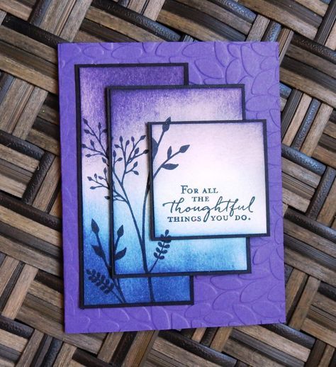 a close up of a greeting card on a table with wood planks in the background