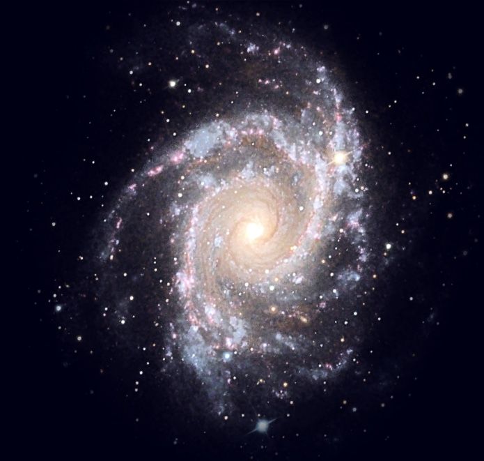 an image of a spiral galaxy in the sky