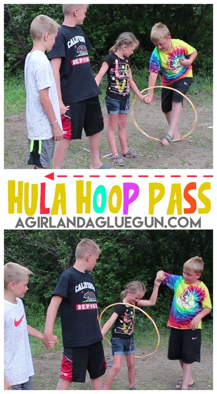 kids playing with hula hoop pass in the park