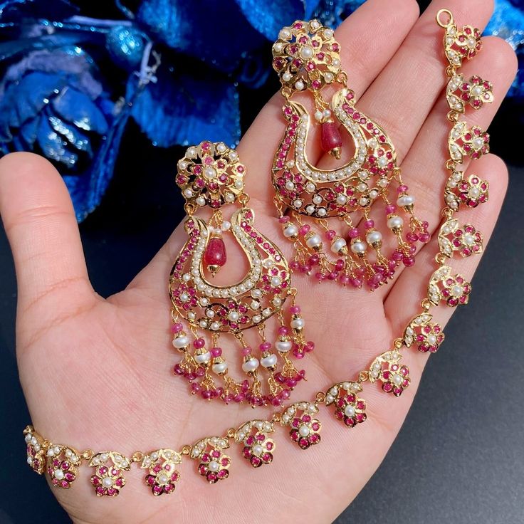 buy gold plated ruby necklace online Ruby Jewelry Set With Stone Work As Gift, Festive Handmade Ruby Jewelry, Traditional Kundan Jewelry Sets Hallmarked, Handmade Ruby Jewelry For Festive Occasions, Handmade Ruby Temple Jewelry, Elegant Chandbali Ruby Jewelry Sets, Bollywood Ruby Jewelry With Matching Earrings, Fine Jewelry Sets Hand Set For Festive Occasions, Traditional Ruby Jewelry Sets For Diwali