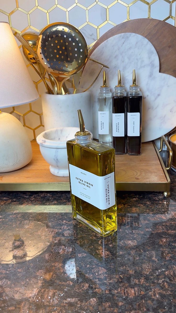 a bottle of perfume sitting on top of a counter