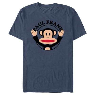 Get lost in the bright and colorful world of Paul Frank with all new officially licensed apparel featuring your favorite playful and happy characters from Planned Pines past and present! The cheerful and iconic Julius the Monkey is encircled by "Paul Frank" in black text on this classy men's graphic t-shirt. Grab one of these sweet new tees today and let your imagination run wild with these pop culture icons! Fun Character Print T-shirt For Fan Conventions, Cartoon Print Crew Neck T-shirt For Fans, Fan Apparel Crew Neck T-shirt With Cartoon Print, Pop Culture T-shirt With Character Print And Relaxed Fit, Blue Pop Culture T-shirt With Character Print, Pop Culture Crew Neck T-shirt With Cartoon Print, Pop Culture Cartoon Print Crew Neck T-shirt, Fun Fan Merchandise T-shirt With Front Print, Fan Apparel T-shirt With Cartoon Print